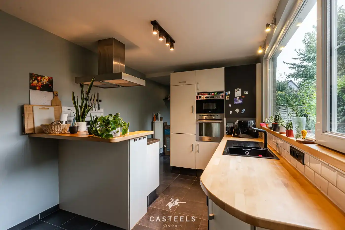 Centraal gelegen rijwoning met tuin in Sint-Denijs-Westrem foto 14
