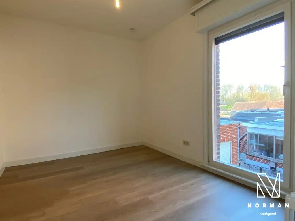 Charmante rijwoning op een boogscheut van het centrum Kuurne te huur foto 12