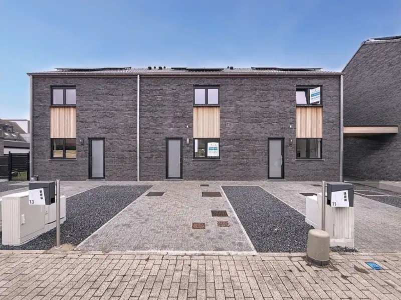 Stijlvolle nieuwbouwwoning in het centrum van Kaprijke! foto {{pictureIndex}}