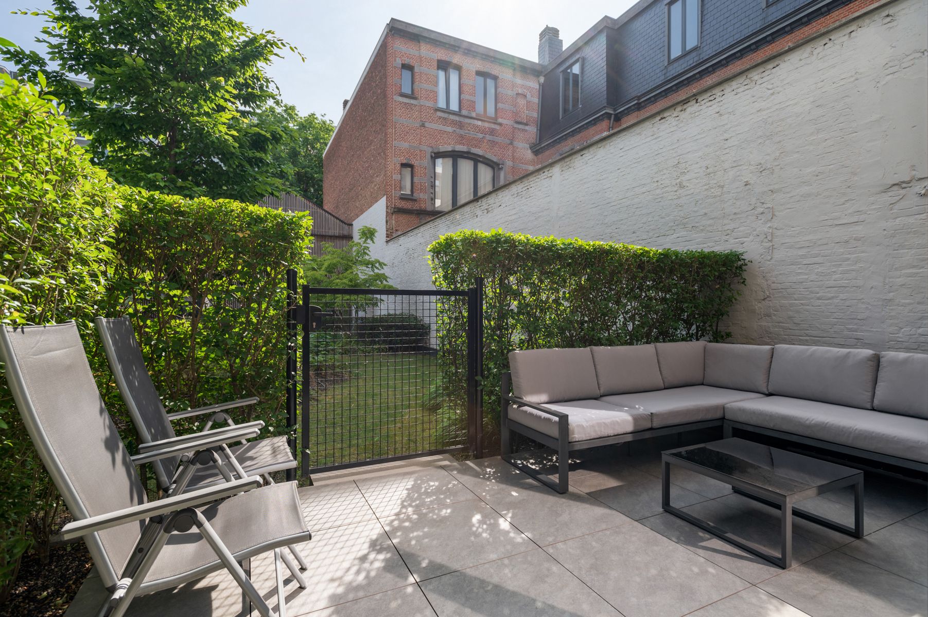 Energiezuinig gelijkvloers appartement met terras en tuin foto 24