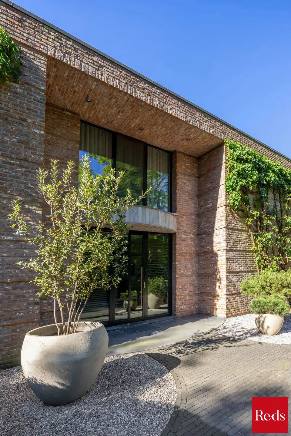 Architectenvilla met zwembad en ZW tuin in Hof Ter Linden foto 4