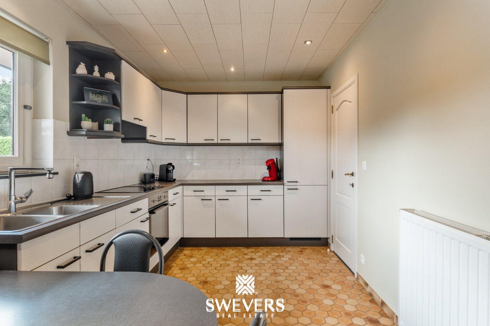 Op te frissen vrijstaande woning te Heusden-Zolder foto 12