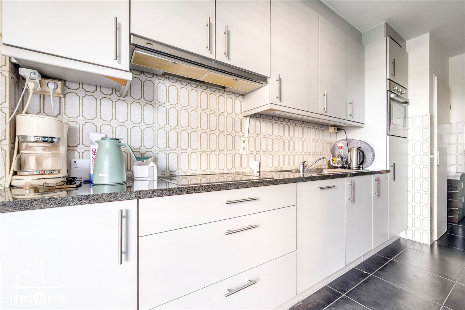 Goed onderhouden verhuurd appartement  met 2 slaapkamers foto 10