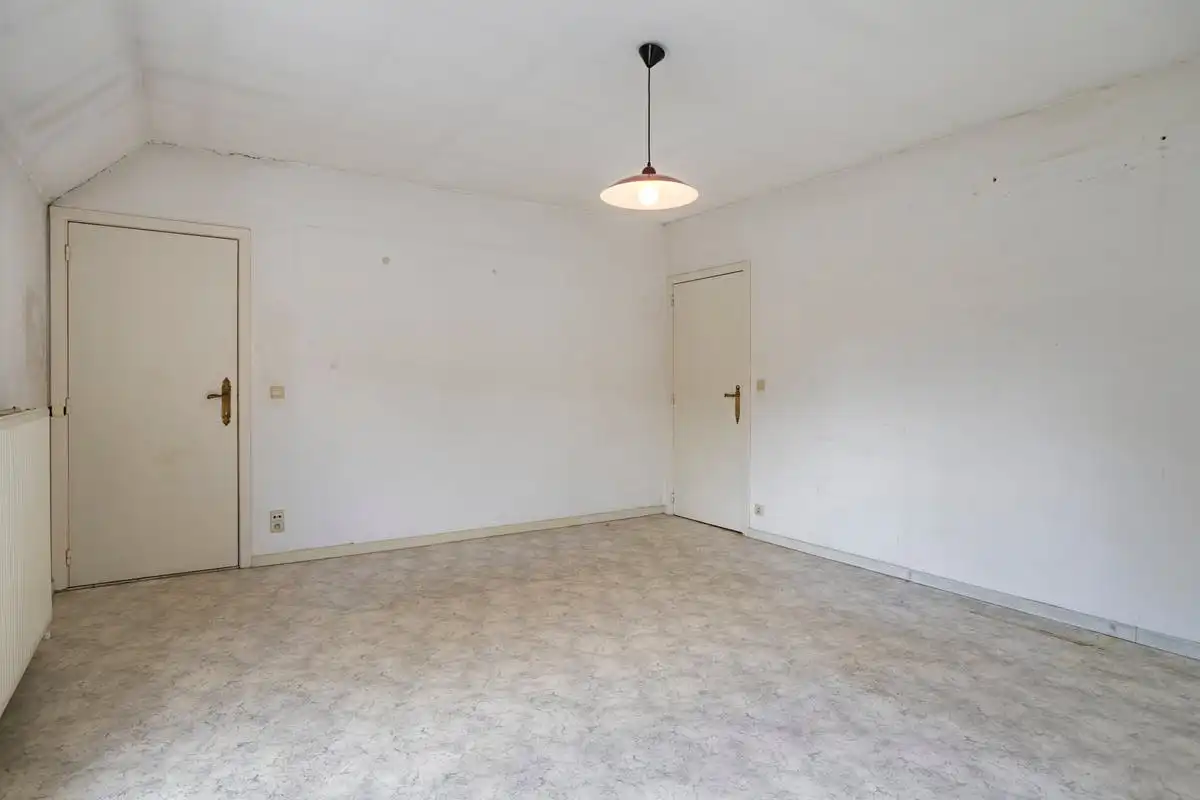 Ruime te renoveren gezinswoning op 588 m² te koop te Heule! foto 13