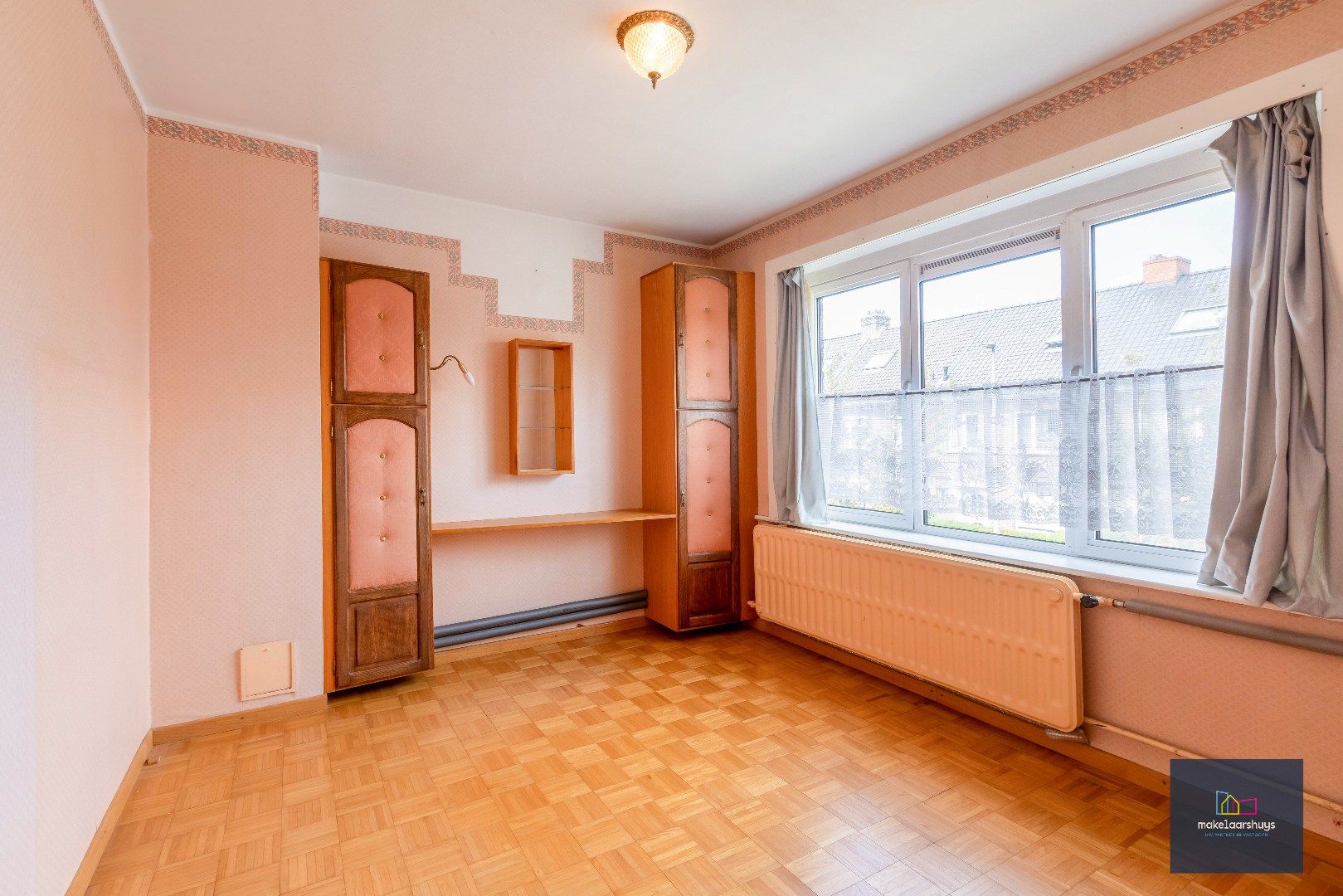 Gunstig gelegen woning met tuin en garage foto 14