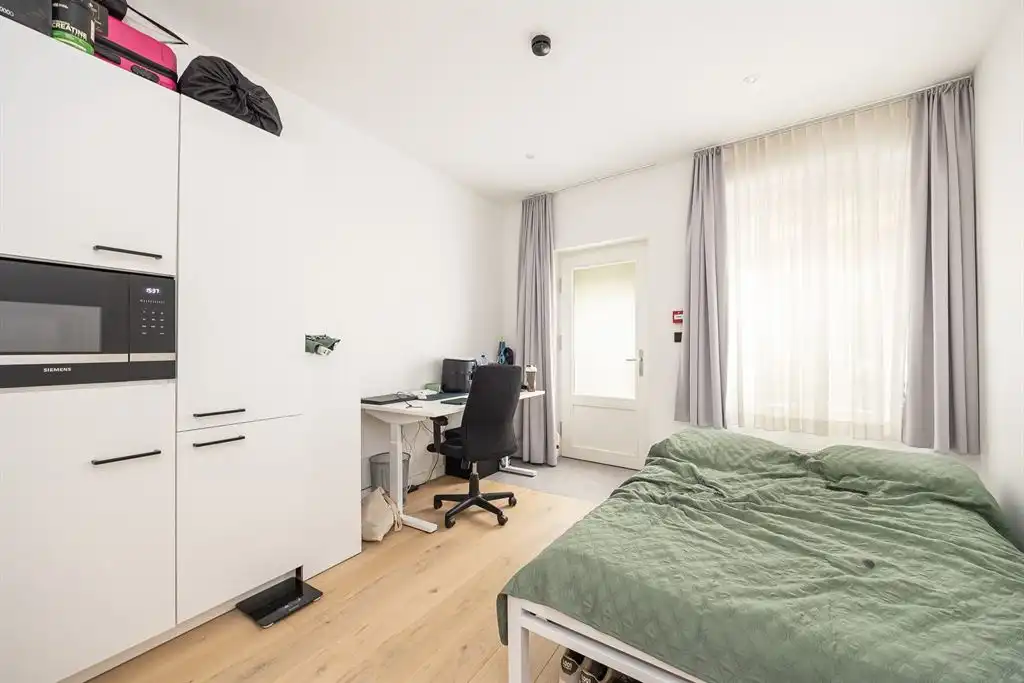 Hoogwaardige studentenkamer in centrum Leuven foto {{pictureIndex}}