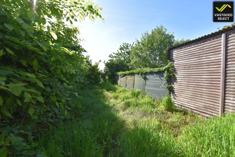 Vastgoed Select: Rijwoning met westgerichte tuin, open zicht, garage en 2 slaapkamers in Eeklo foto 3