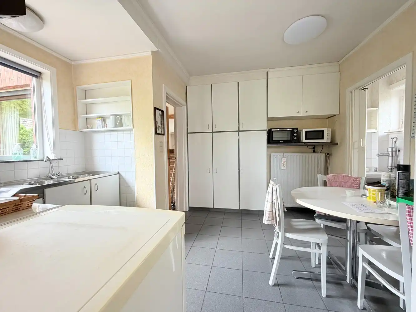 Op te frissen alleenstaande woning met riante tuin foto 10