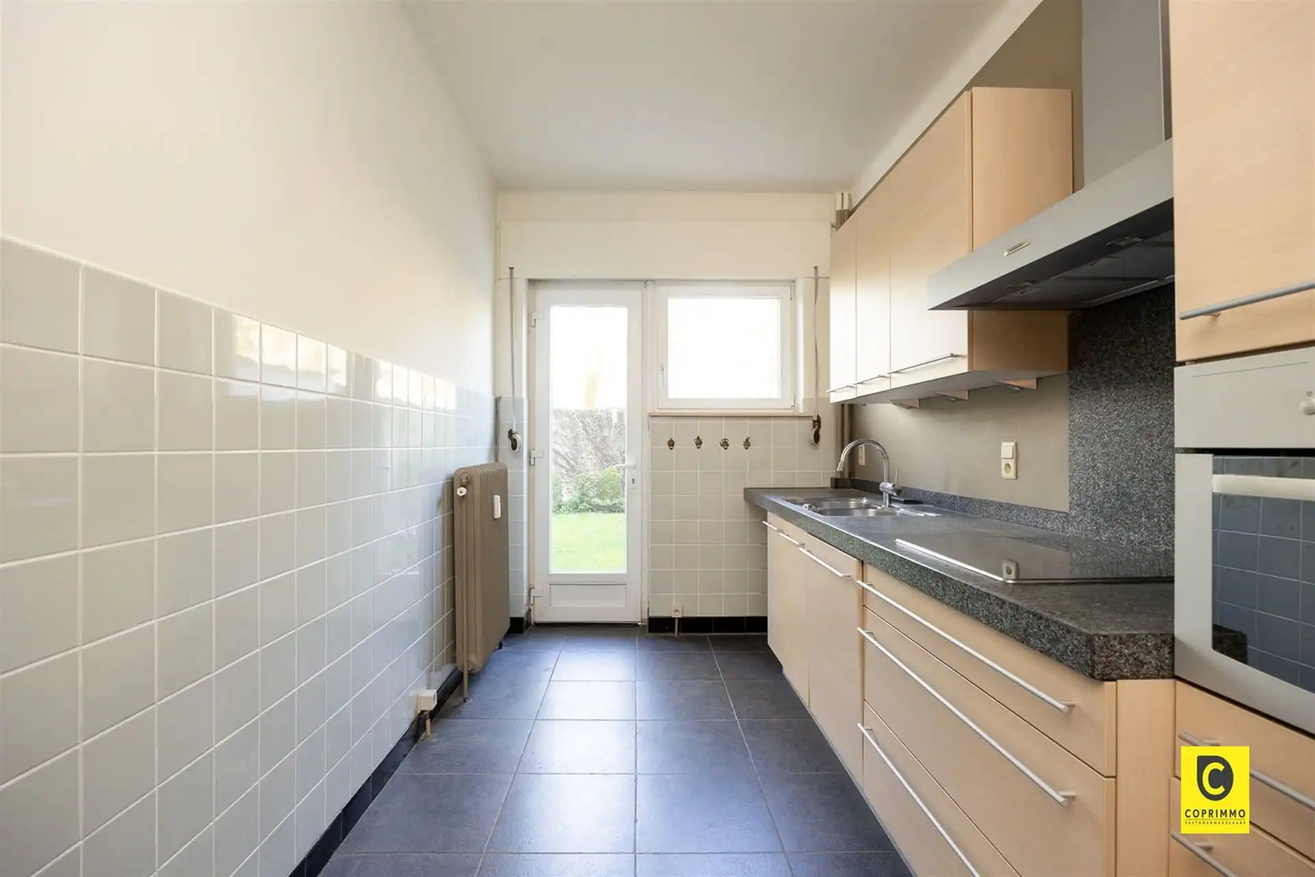 Charmant gelijkvloers appartement met tuin! foto 9