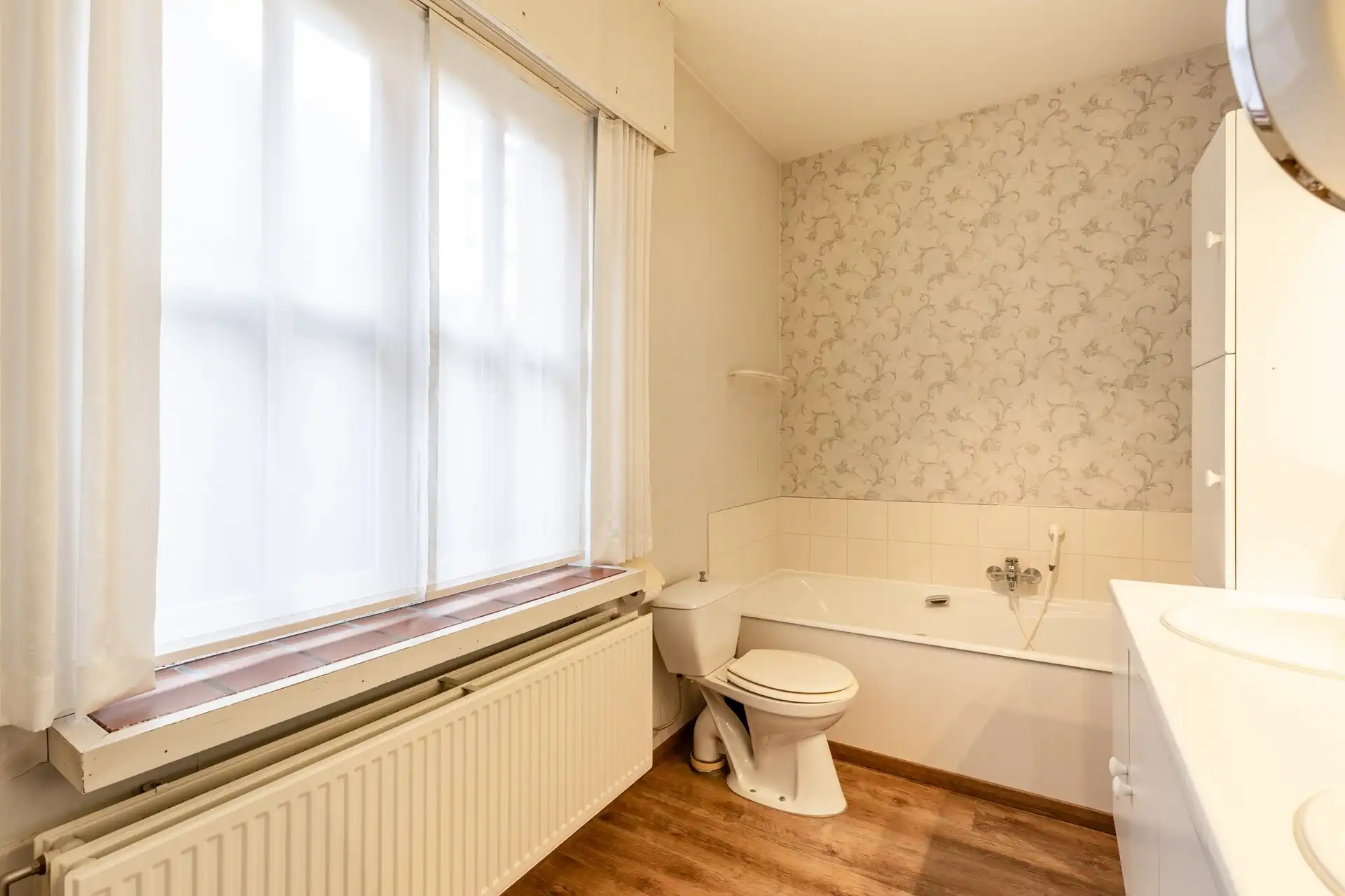 Instapklare woning met ruime veranda en zuidgerichte tuin! foto 14