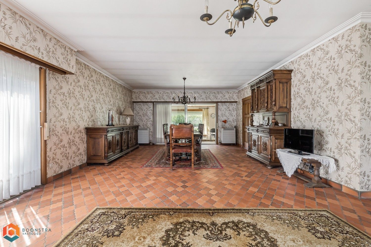 Te renoveren woning met 3 slpkrs op een ruim perceel foto 3