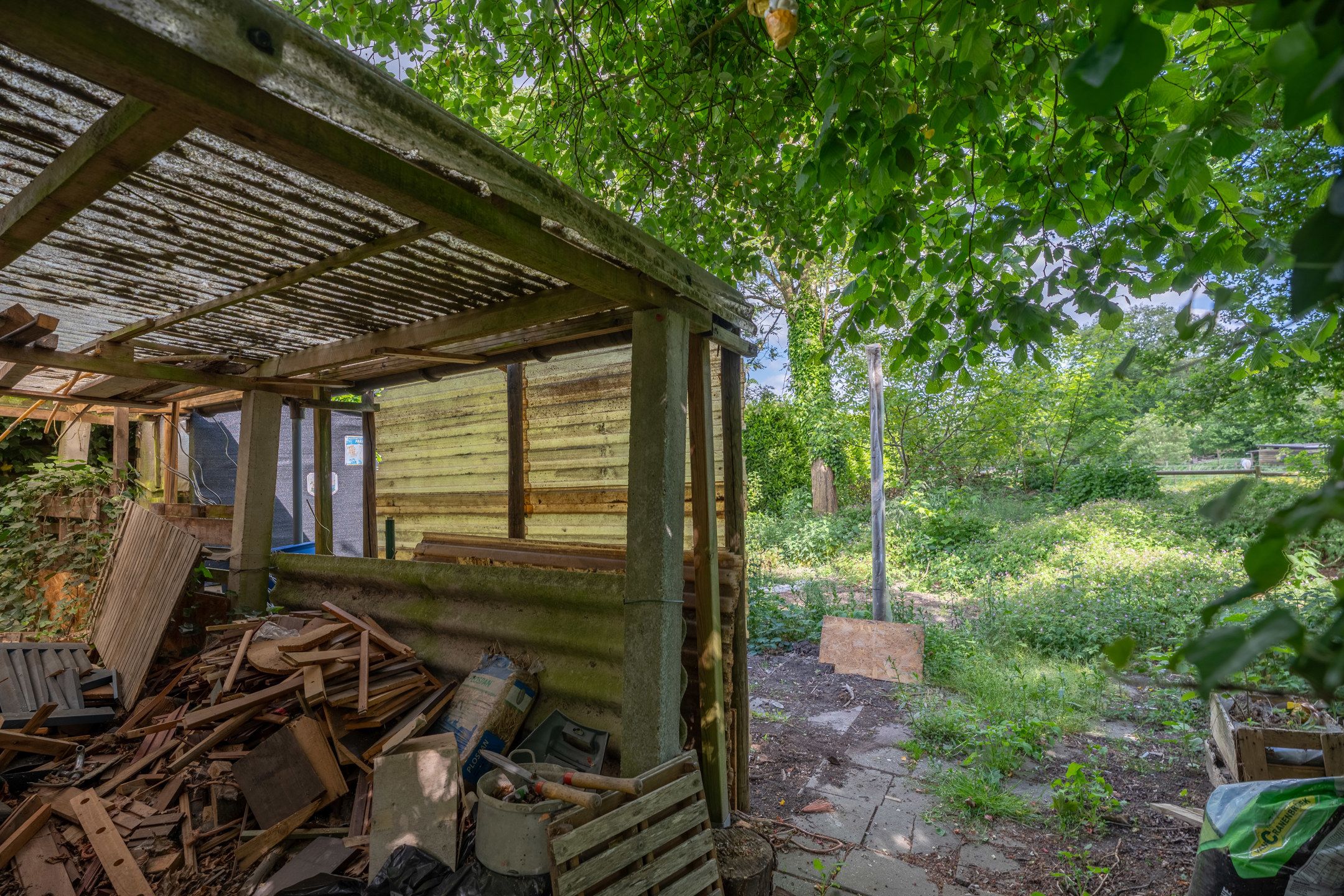 Te renoveren gelijkvloerswoning op mooi perceel van 1.437 m² foto 34