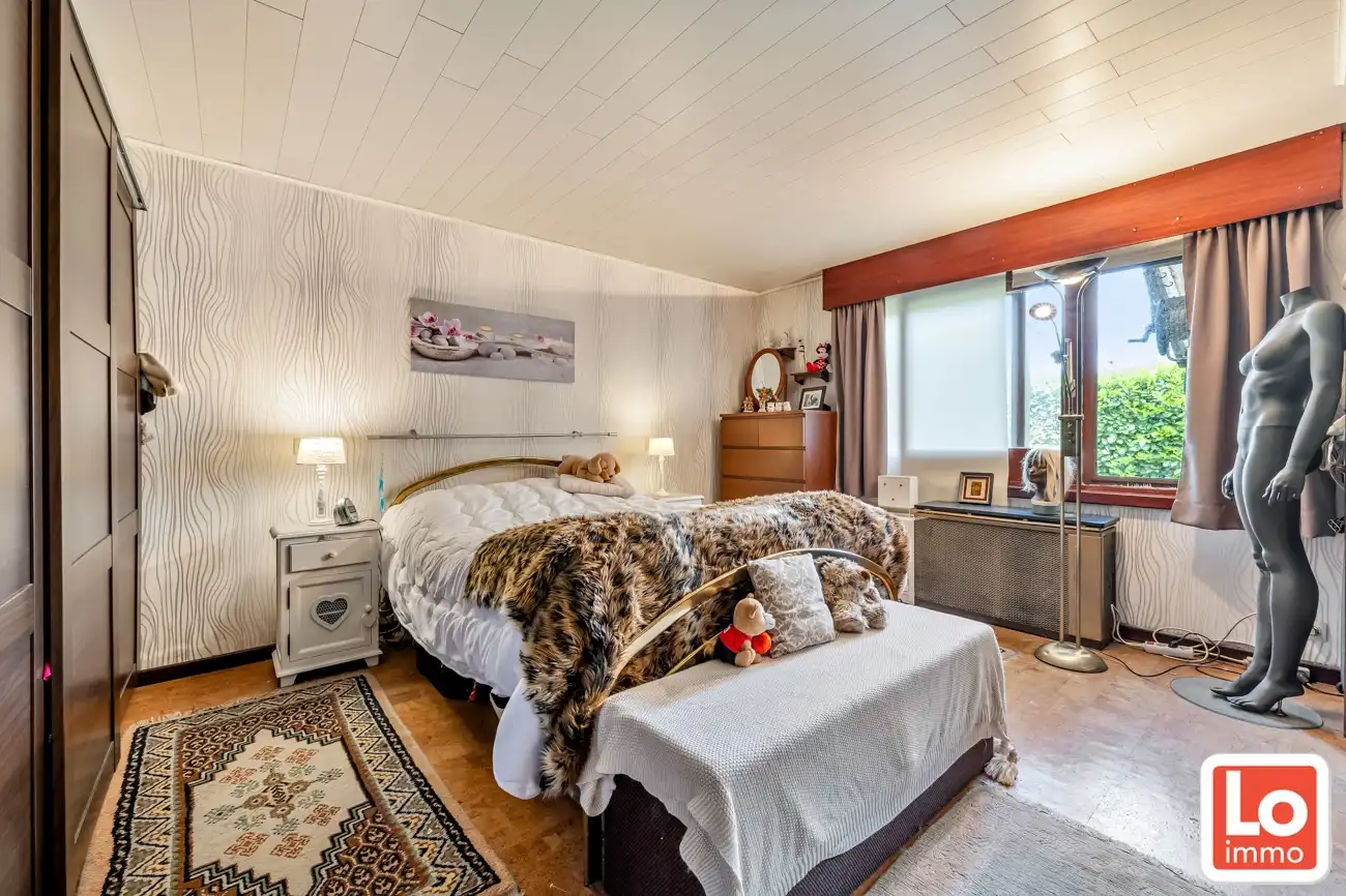 IN OPTIE! Te renoveren gelijkvloers woning met een open zicht op de achterliggende velden. foto 10