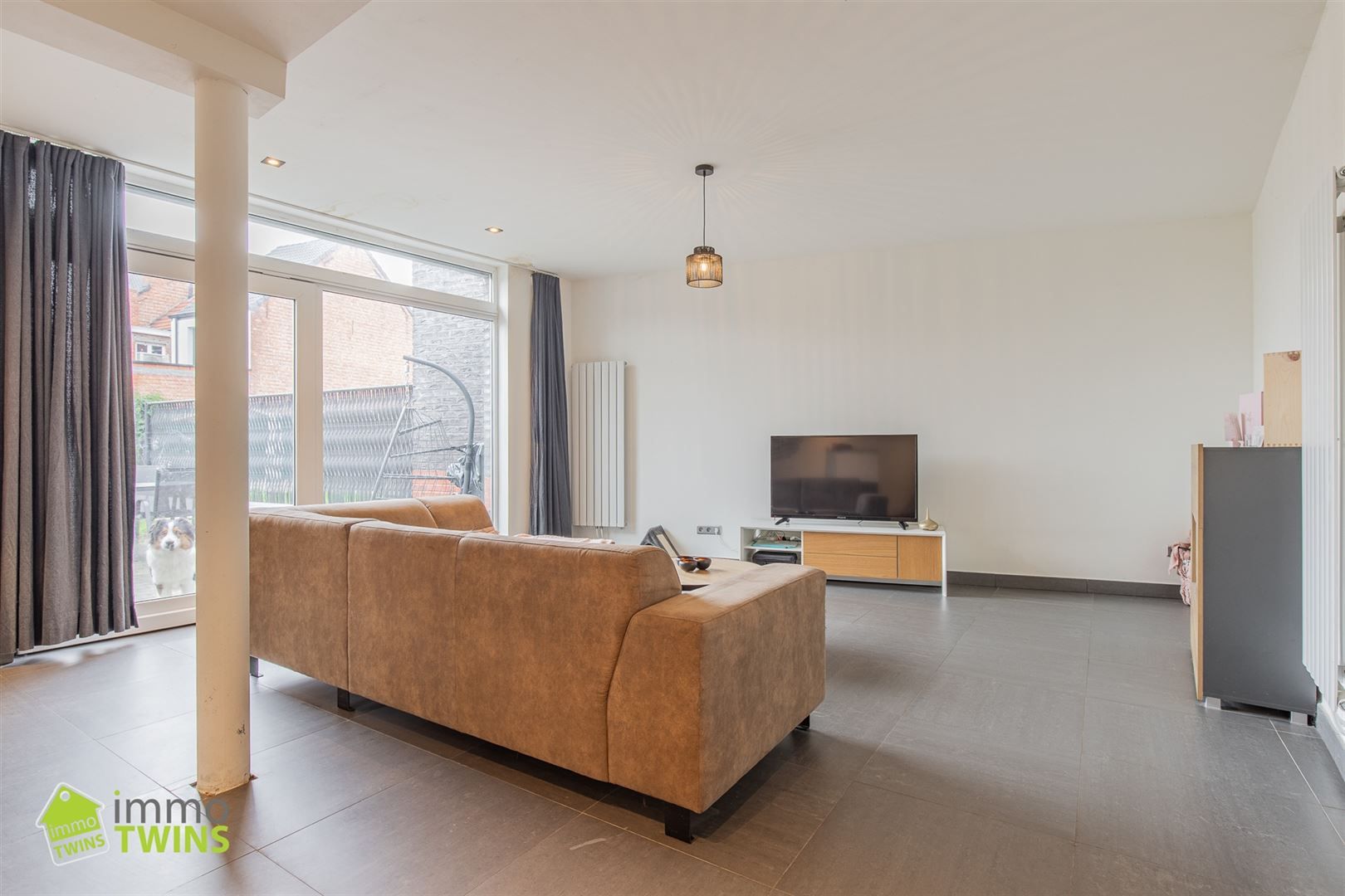 Ruime en lichtrijke gezinswoning met zonnige tuin en inpandige garage in Lebbeke foto 4