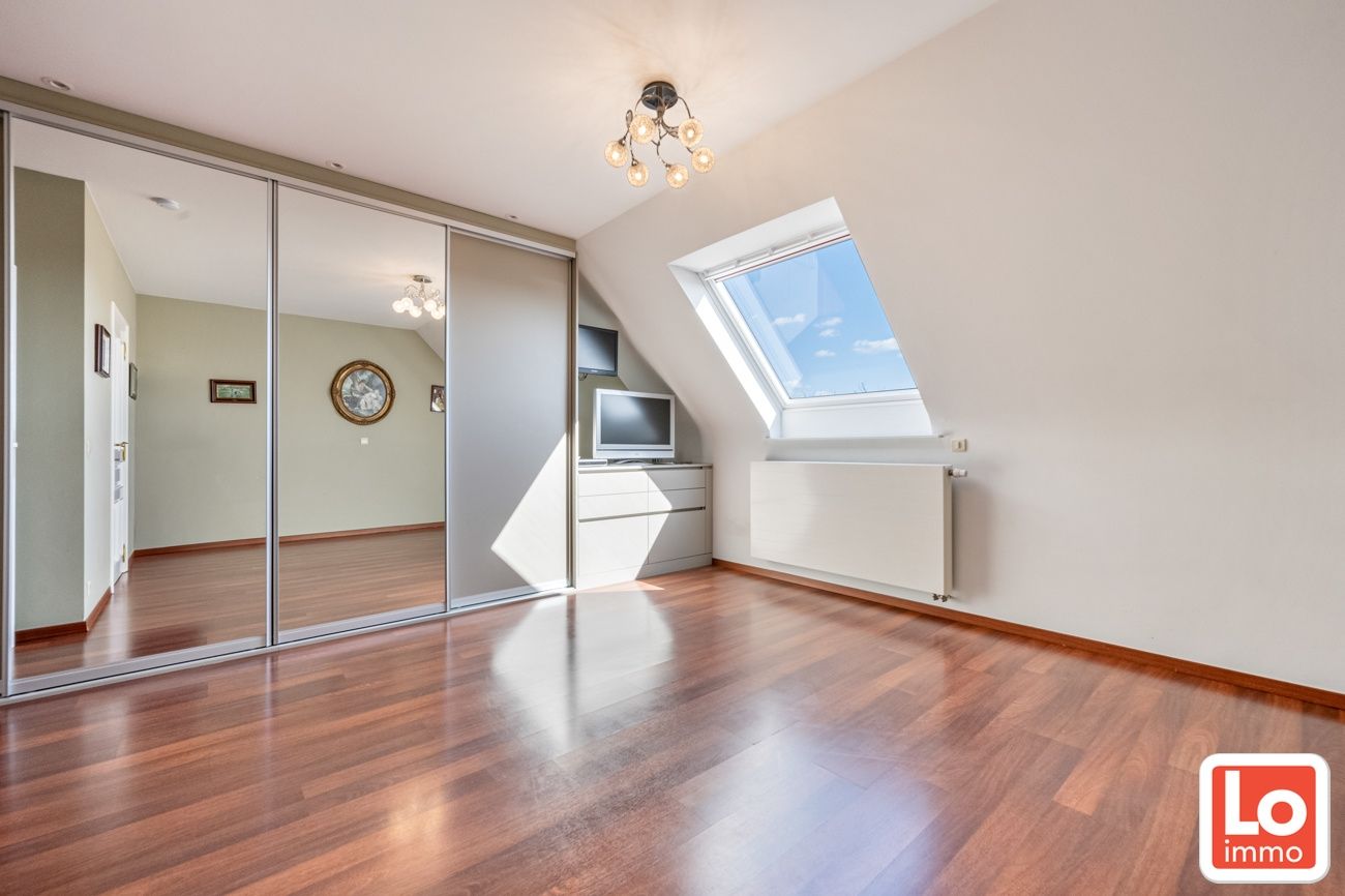 Mooi dakappartement met 3 slaapkamers, 2 badkamers, 2 terrassen (18m² & 5m²) en garagebox foto 9