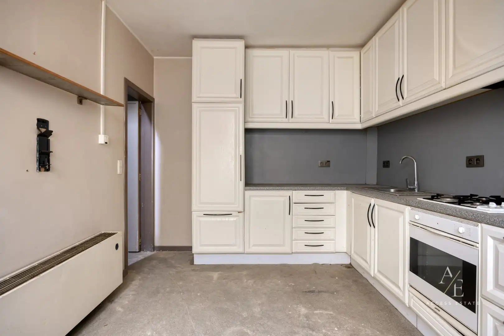 Veelzijdig te renoveren eigendom met tuin en 2 garages en achterdoorgang in Temse foto 13