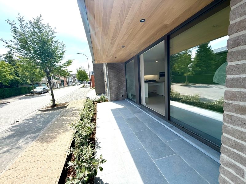 Gelijkvloers nieuwbouwappartement met 1 slaapkamer, zonnig terras en carport foto 14
