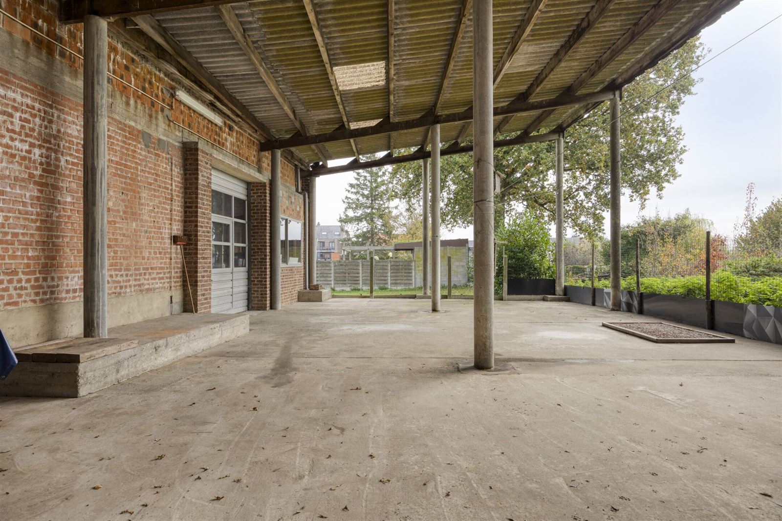 Woning met ruime loods te koop foto 40