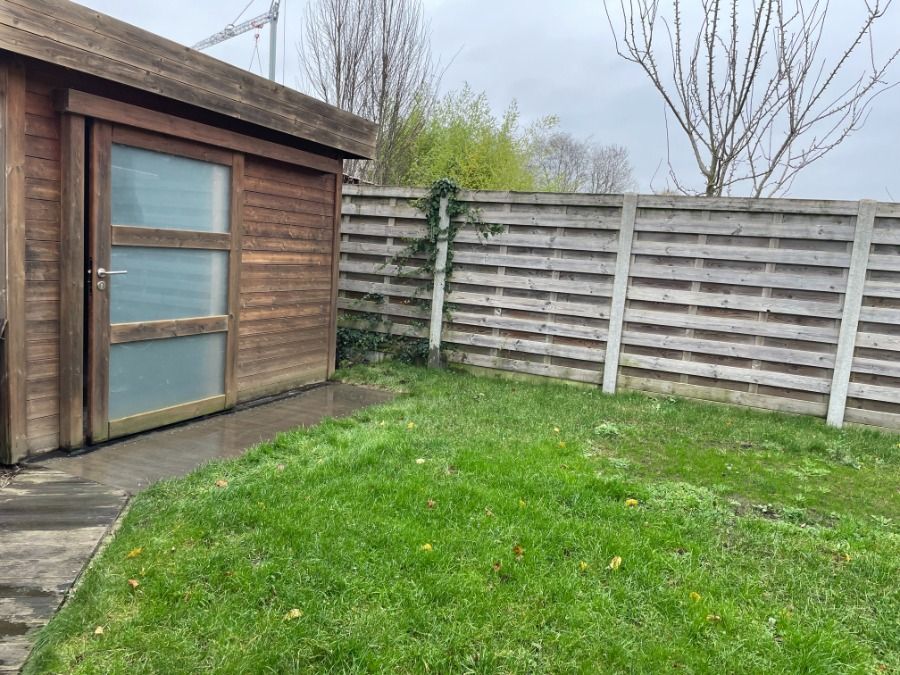 EENGEZINSWONING + tuin foto 7