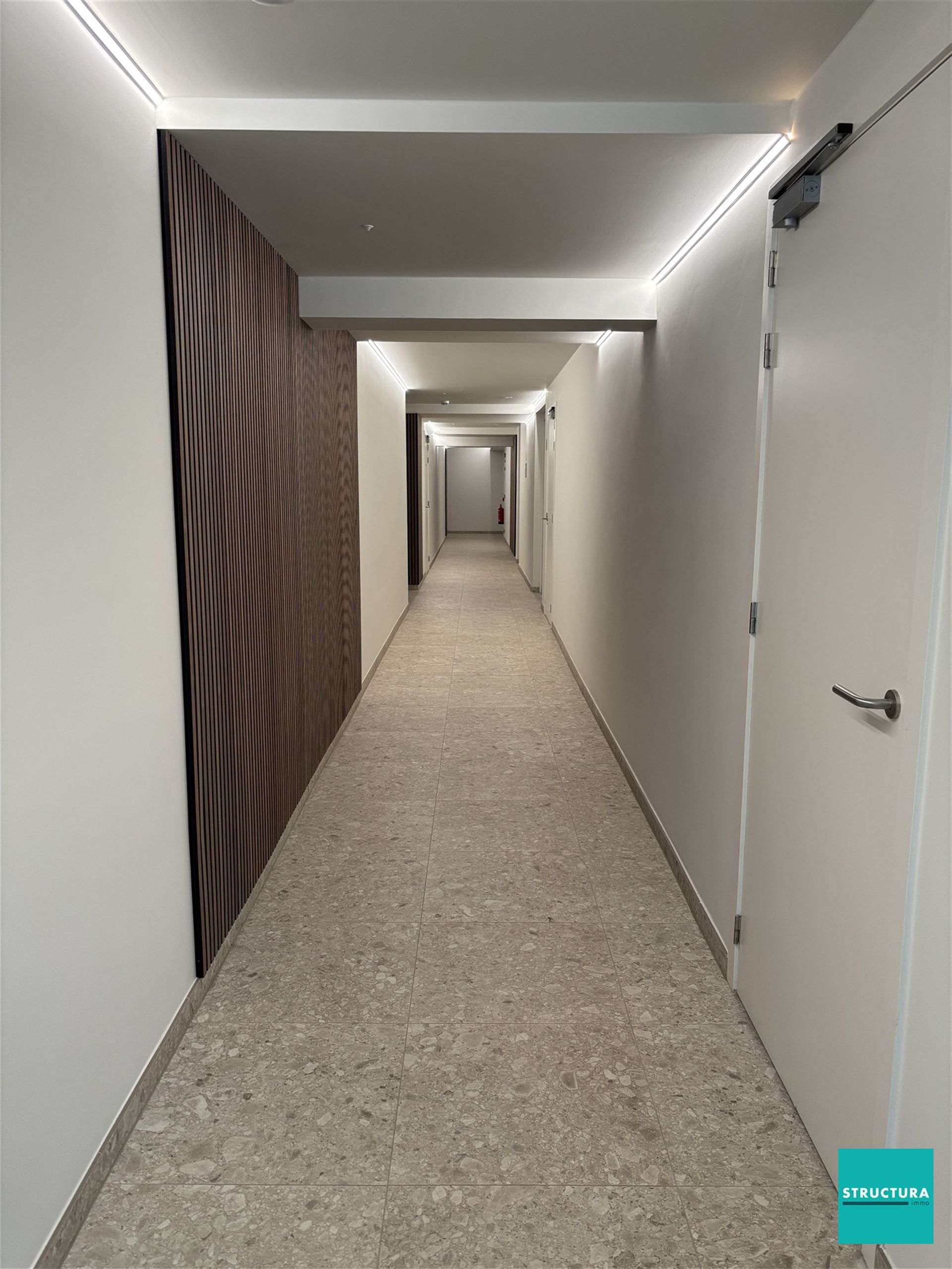 Ruim nieuwbouw appartement met tuin en staanplaats foto 24