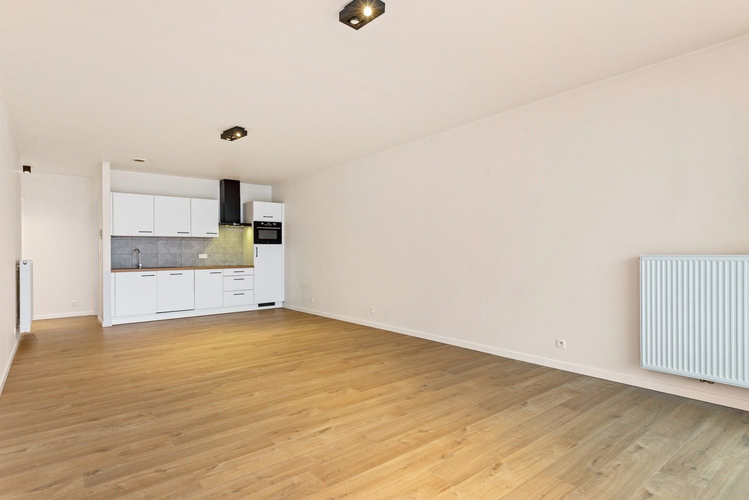 Modern appartement met 2 slaapkamers, terras & autostaanplaats op toplocatie in Lier! foto 7