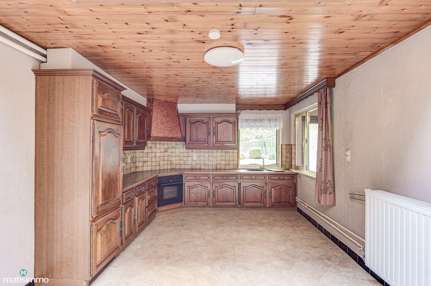 GEZINSWONING MET RUIME TUIN EN DRIE SLAAPKAMERS IN MARTENSLINDE foto 11