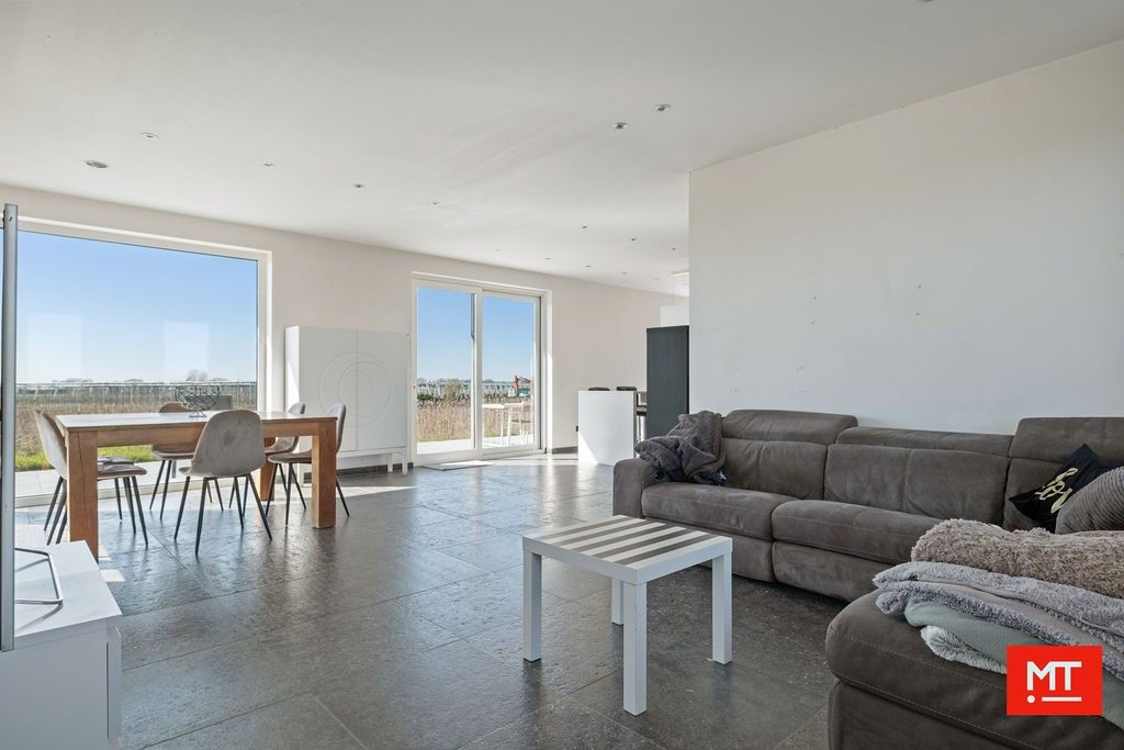 Alleenstaande woning met landelijk verzicht op 3.584 m² te koop in Ledegem foto 9