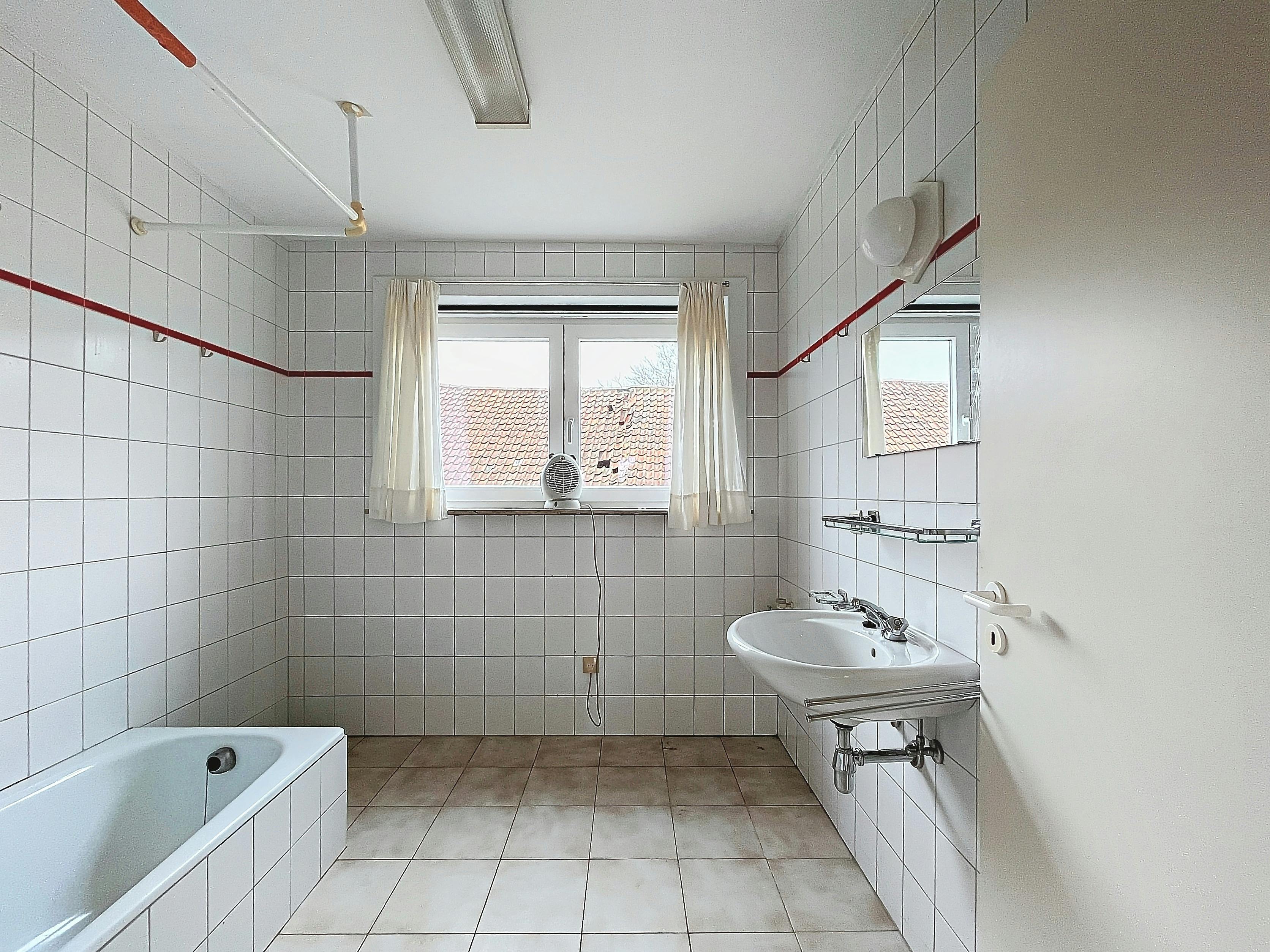 Ruim 1-slaapkamerappartement met garagebox! foto 9