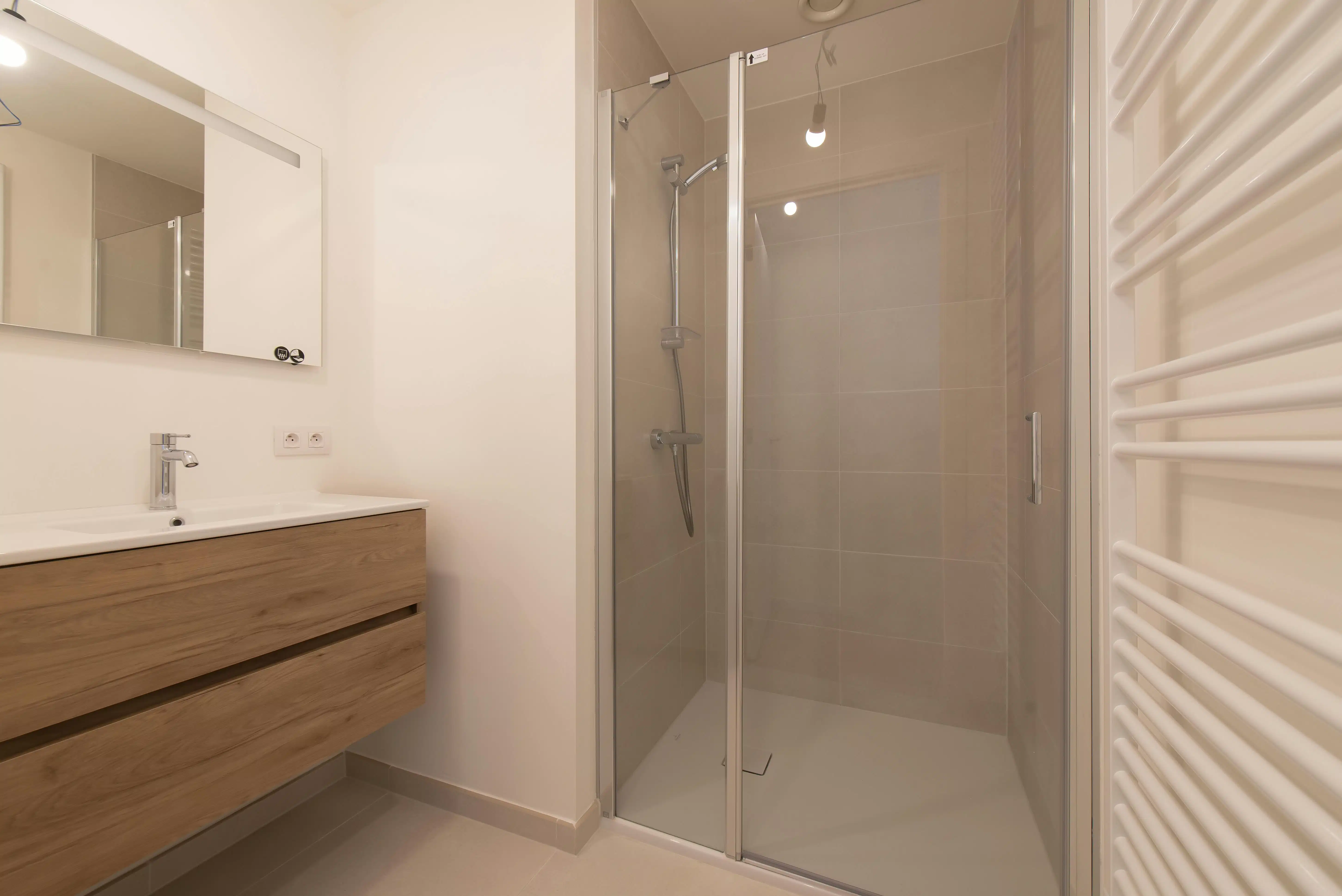 Lichtrijk nieuwbouw 1-slaapkamer appartement te Oostende foto 11