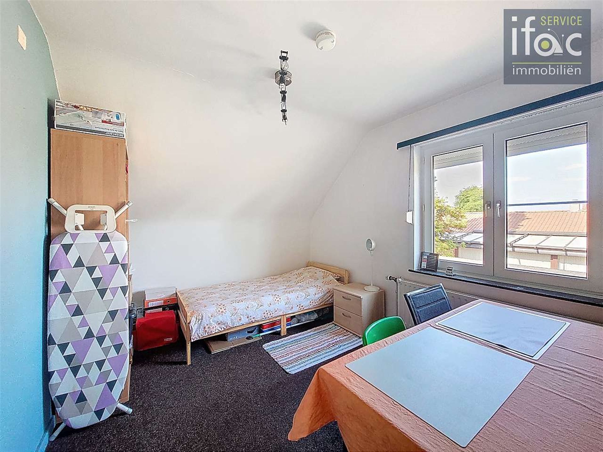 Centraal gelegen driegevelwoning met mooie tuin op ±7a foto 19