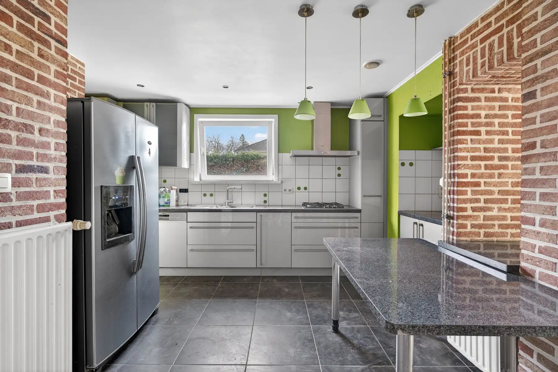 Gezinswoning op hoekperceel op topligging te Sint-Amandsberg foto 4