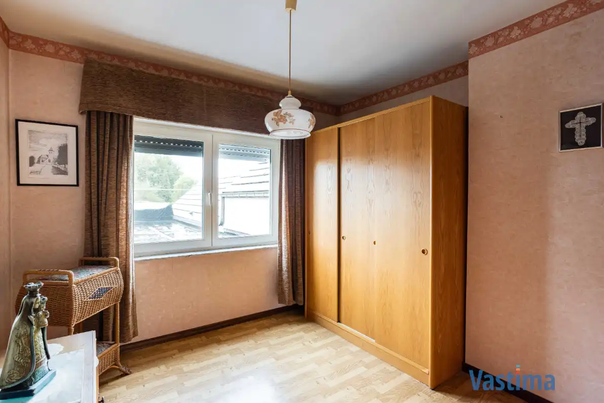 Woning met opslagruimte en grond op strategische ligging foto 16