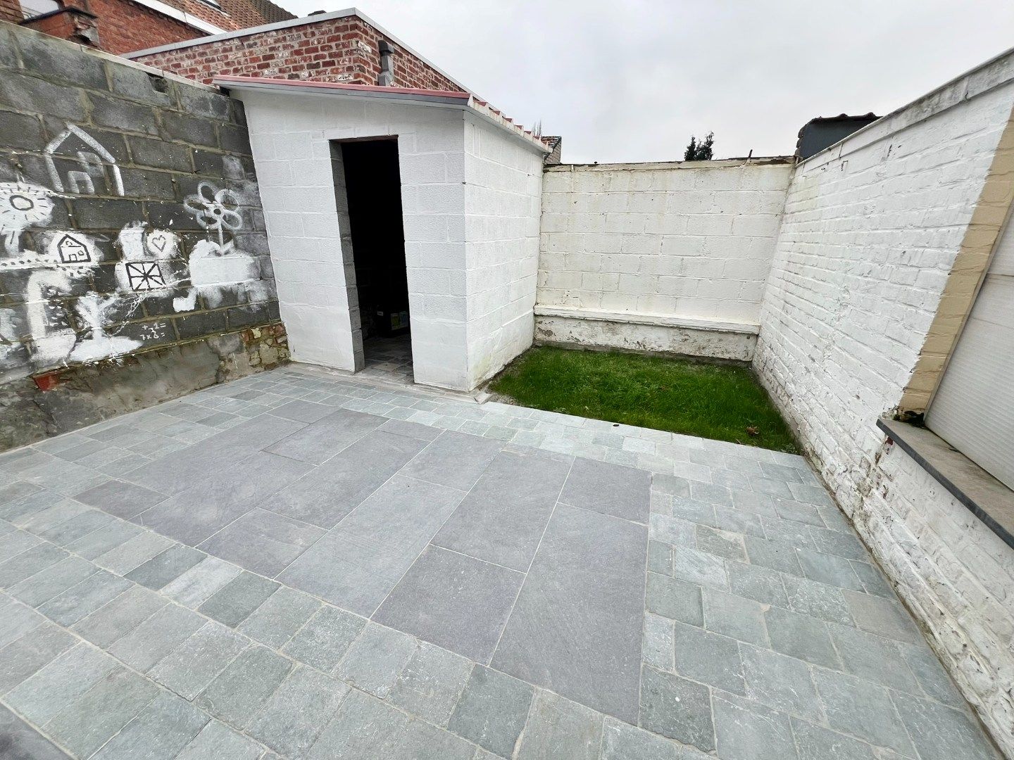 Vernieuwde energiezuinige rijwoning met zonnige stadstuin op centrale ligging.  foto 16