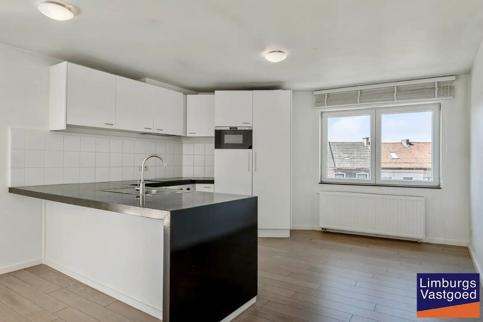 Ruim appartement (125m²) met 2 slpk en terras aan de kleine ring foto 6