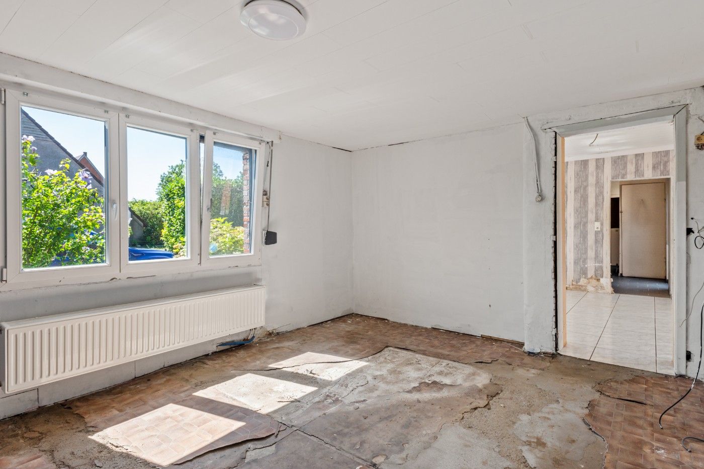 Volledig te renoveren woning met 5 slpk. en koer foto 16