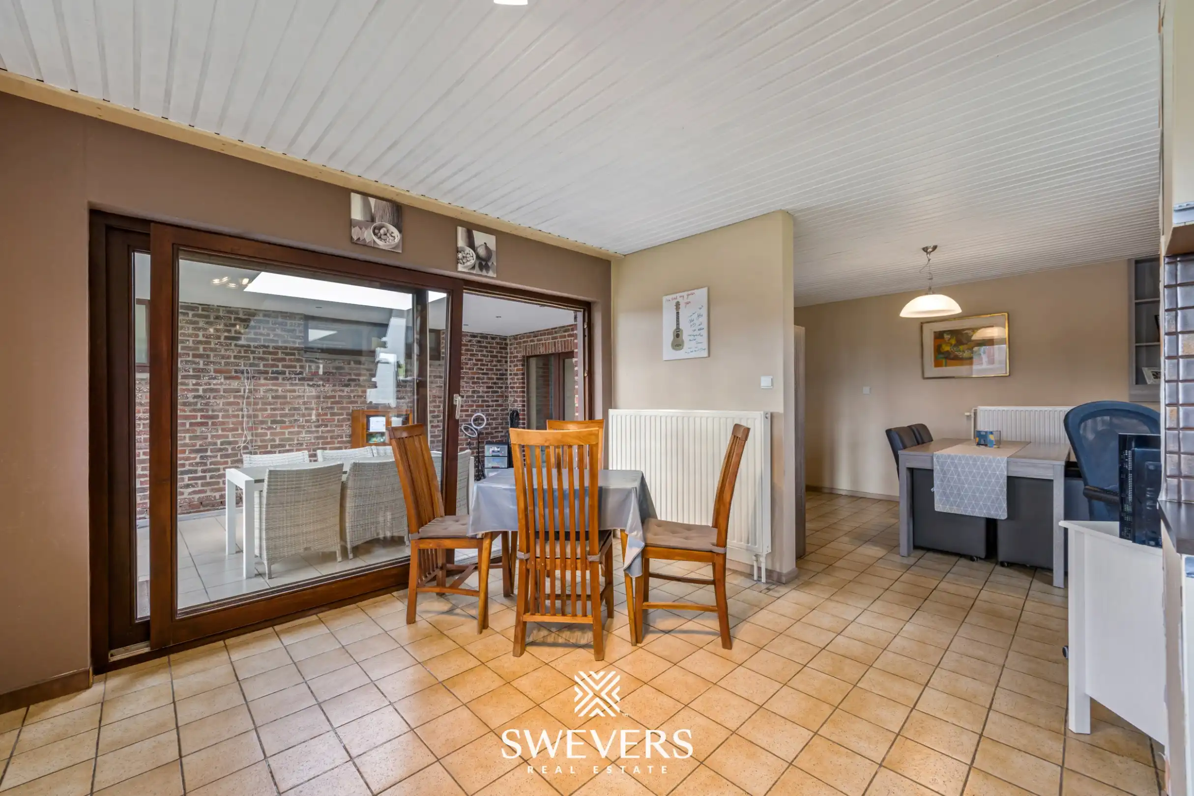 Zonnige woning met ruime zuid georiënteerde tuin in het rustige Diepenbeek foto 12