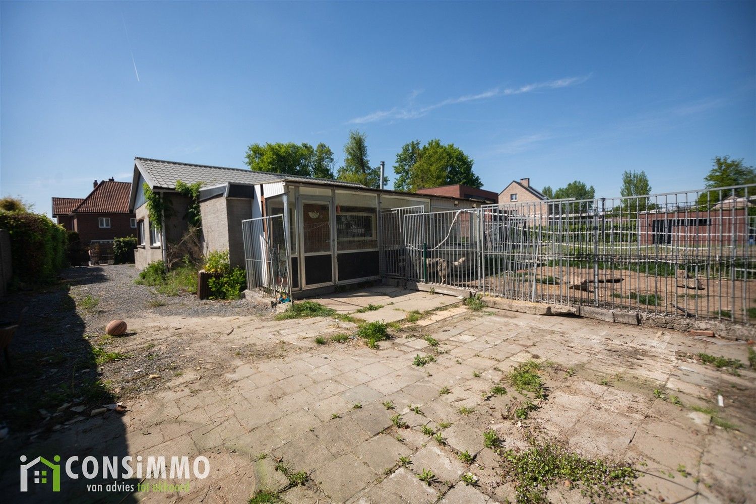 Gelijkvloerse woning met veel potentieel - vergunde nieuwbouwmogelijkheid in Genk foto 15