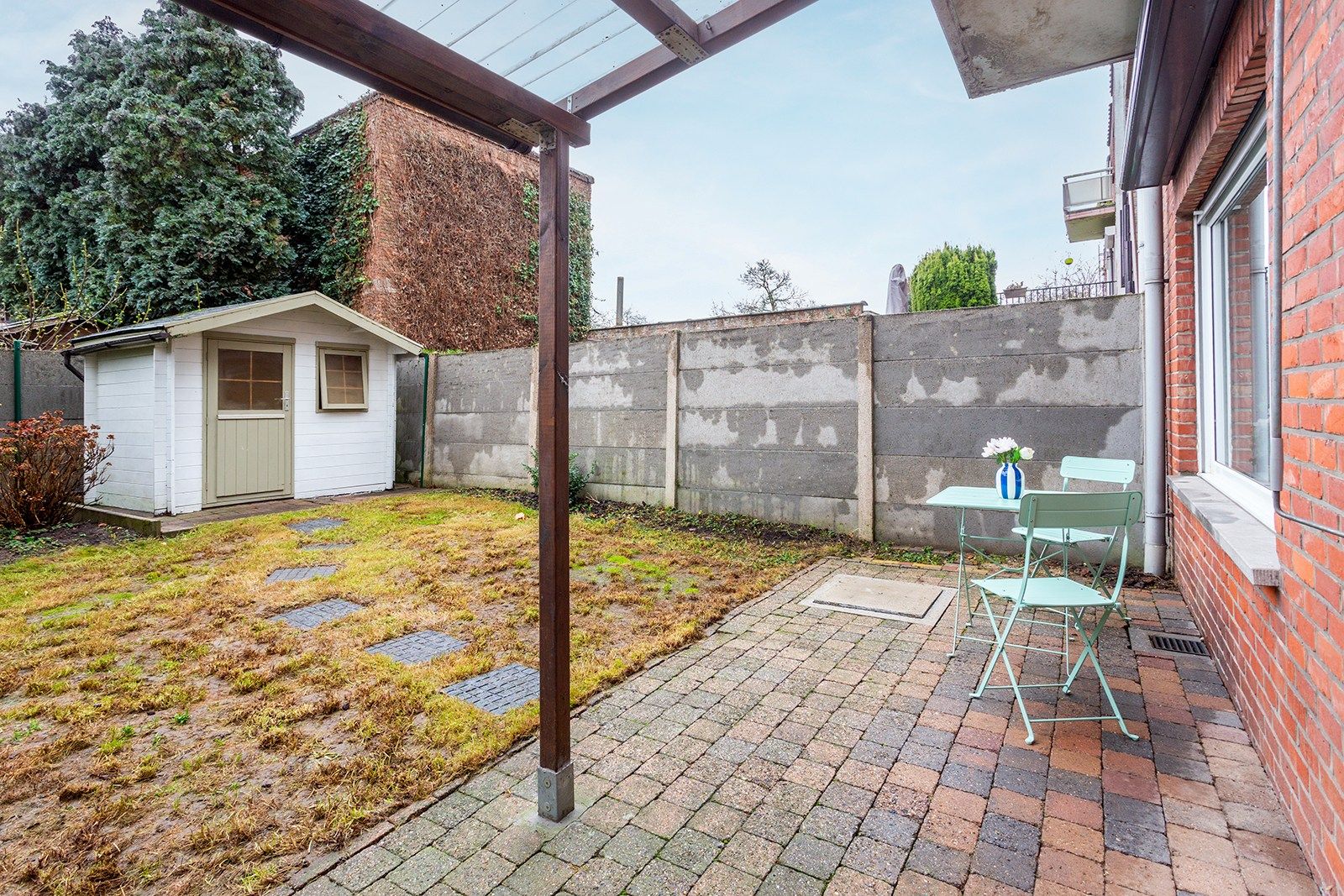 Gelijkvloers appartement met tuin foto 7