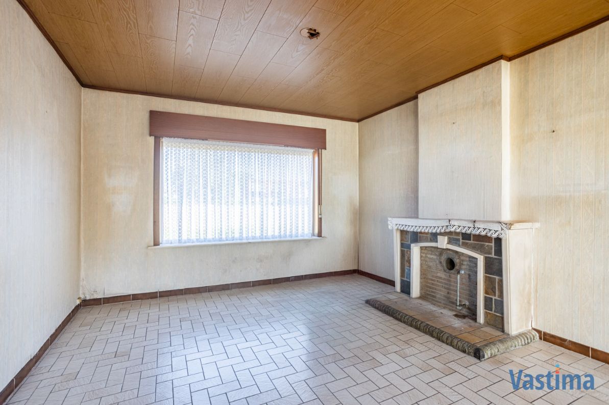 Renovatiewoning met aanpalende bouwgrond nabij centrum Erembodegem foto 7