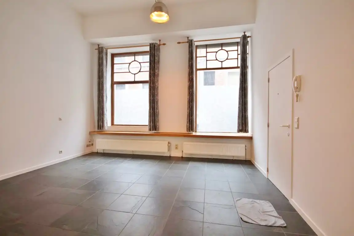 Gunstig gelegen gelijkvloers duplex appartement nabij de Grote Markt foto 4