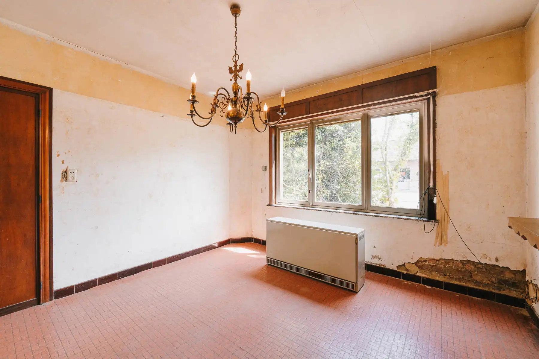 Gezellige, te renoveren open woning in een rustige straat foto 6