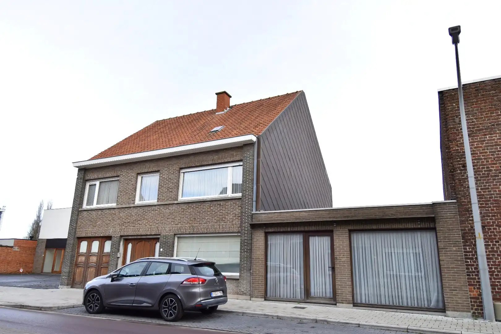 Hoofdfoto van de publicatie: Verzorgde gezinswoning met 3 slaapkamers, tuin en polyvalente ruimte te koop nabij centrum Bissegem