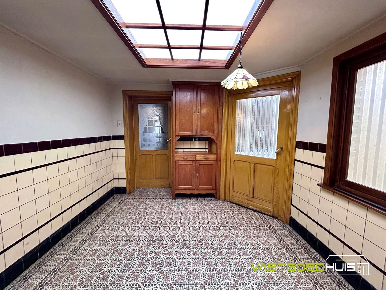 Karaktervolle gezinswoning met authentieke details in Ninove foto 16