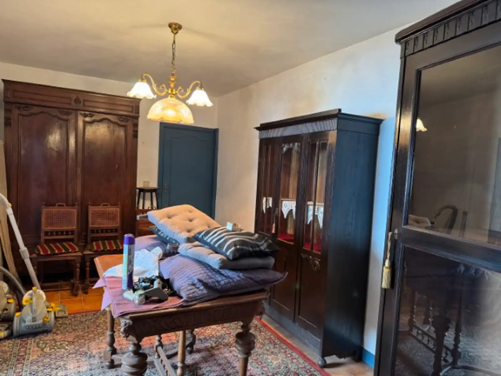 Te renoveren halfopen woning met grote naastliggende tuin foto 4