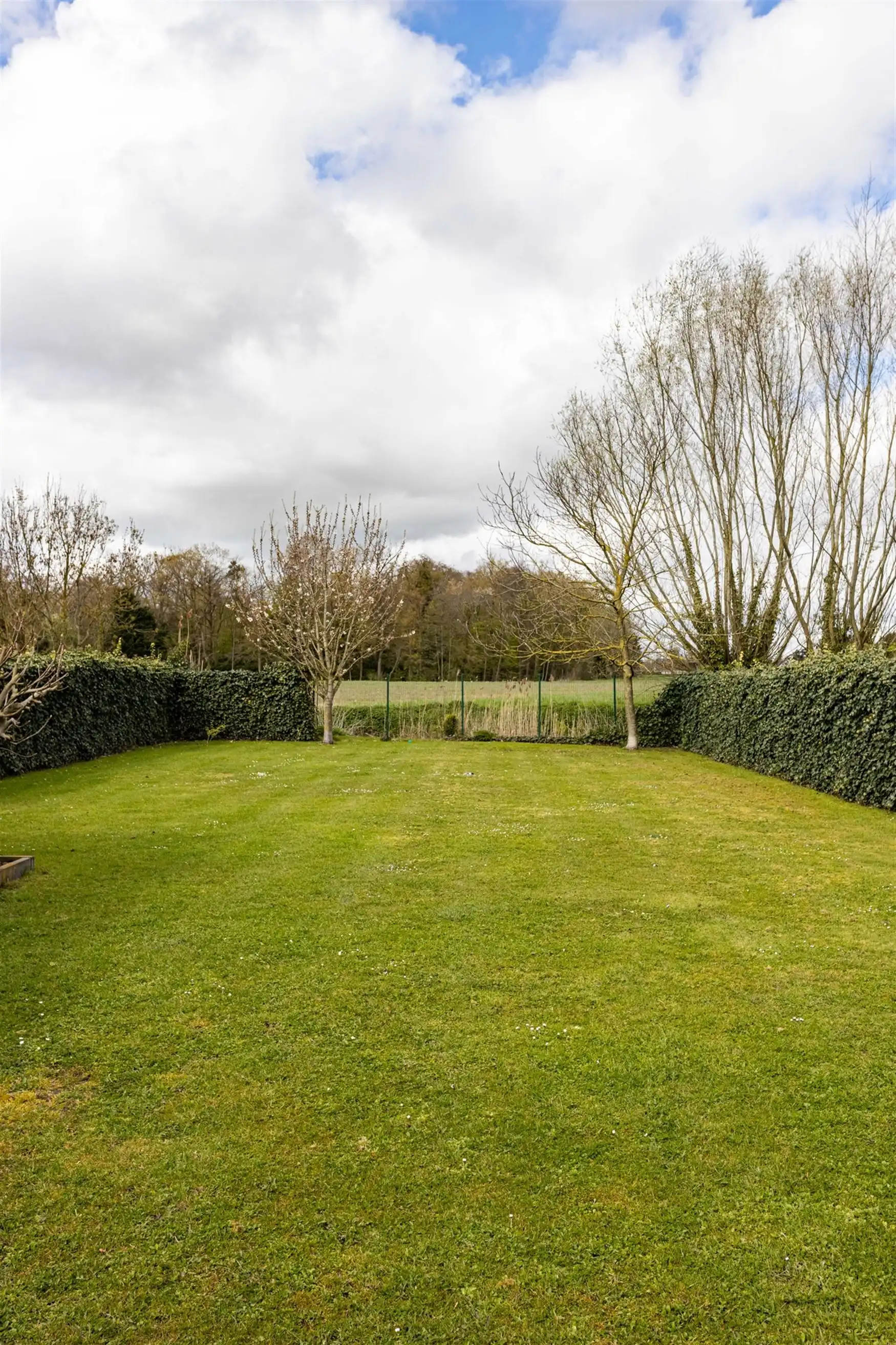 Halfopen woning met zicht op Schipdonkkanaal en velden foto 16