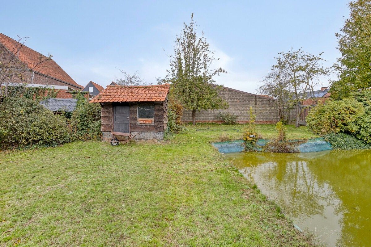 Bijzonder ruime woning met inpandige garage en 3 slks op een perceel van 1218 m². foto 18