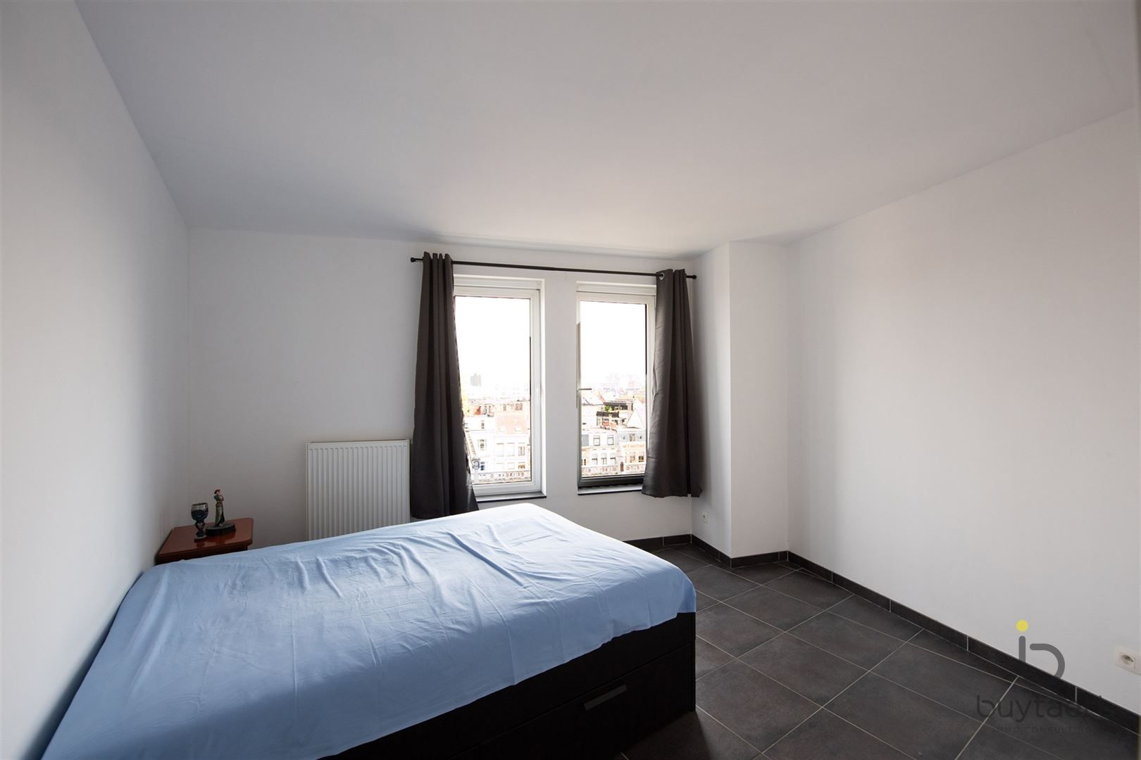 Lichtrijk hoekappartement met prachtig vergezicht over de stad + P foto 14