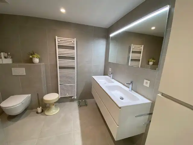 Ruim en instapklaar appartement met 3 slaapkamers, 2 terrassen en garage. foto 15