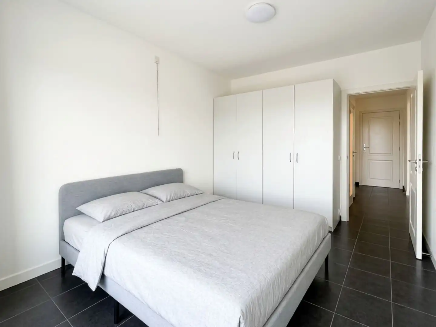 Energiezuinig appartement met terras, garagebox en Leiezicht op toplocatie in Gent foto 11