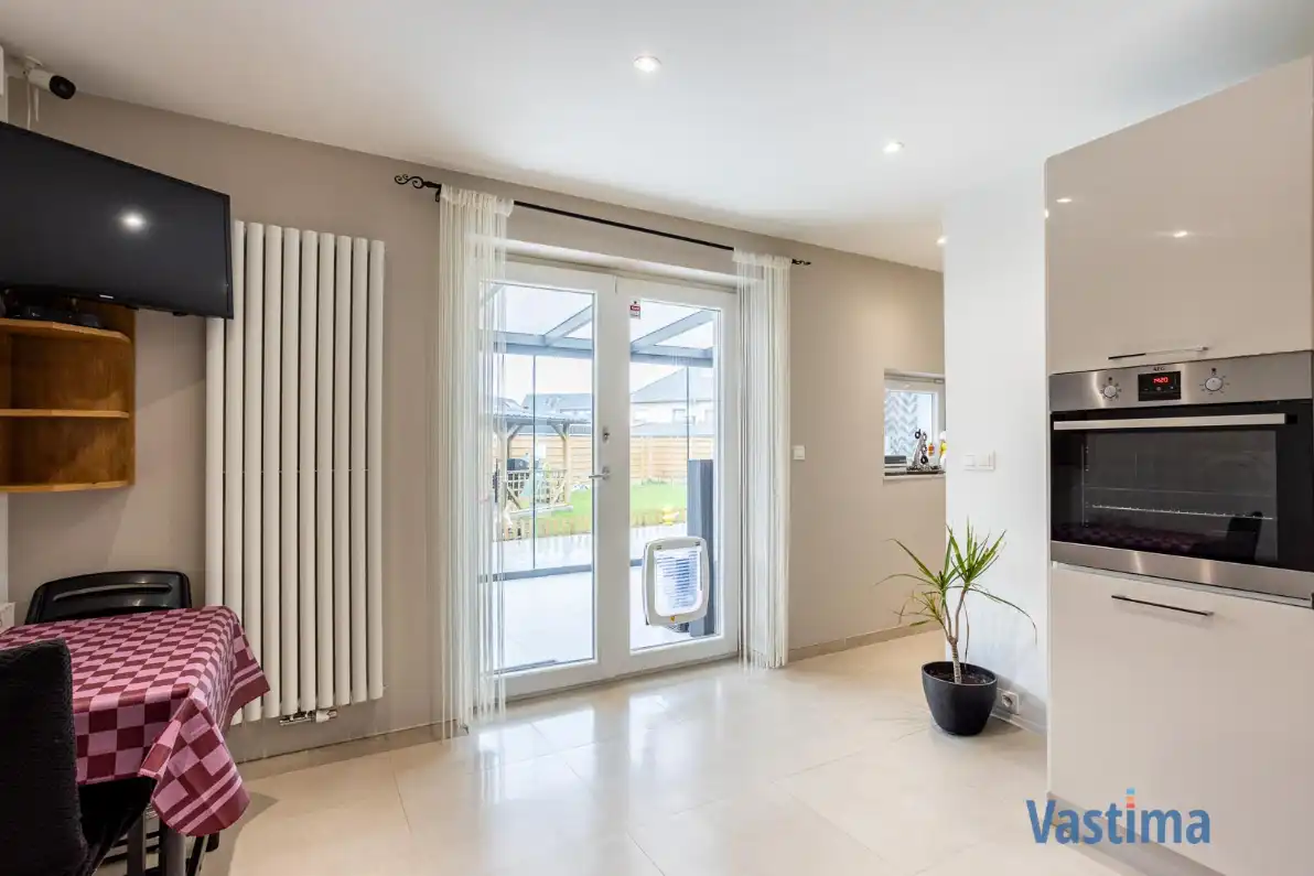 Instapklare, energiezuinige familiewoning met 4 slaapkamers, tuin en garage foto 6